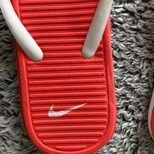 Nike Shoes - Nike - pink & white solarsoft flip flops! Nike Shoes - Nike - pink & white solarsoft flip flops!